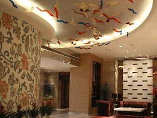 Haishu Taosheng Yiju Business Hotel Ningbo Exterior foto
